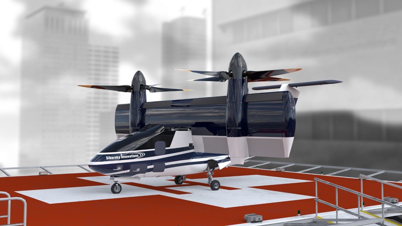 Artist concept of a tilt-wing, hybrid-electric autonomous unmanned aircraft, on city building helipad. 